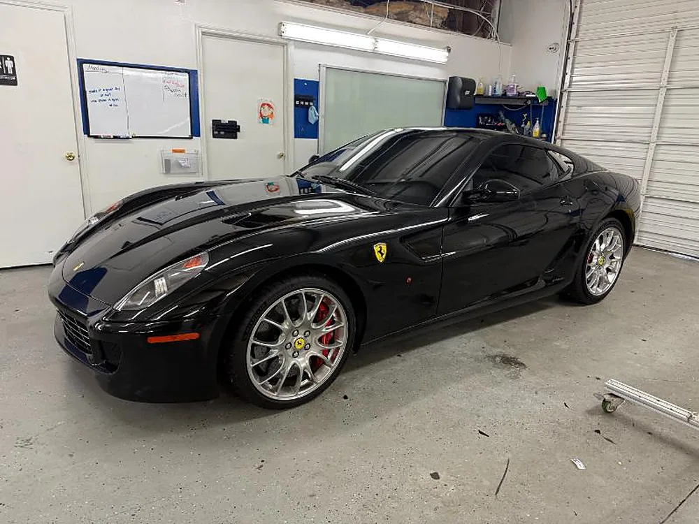 Black Ferrari in the tint bay