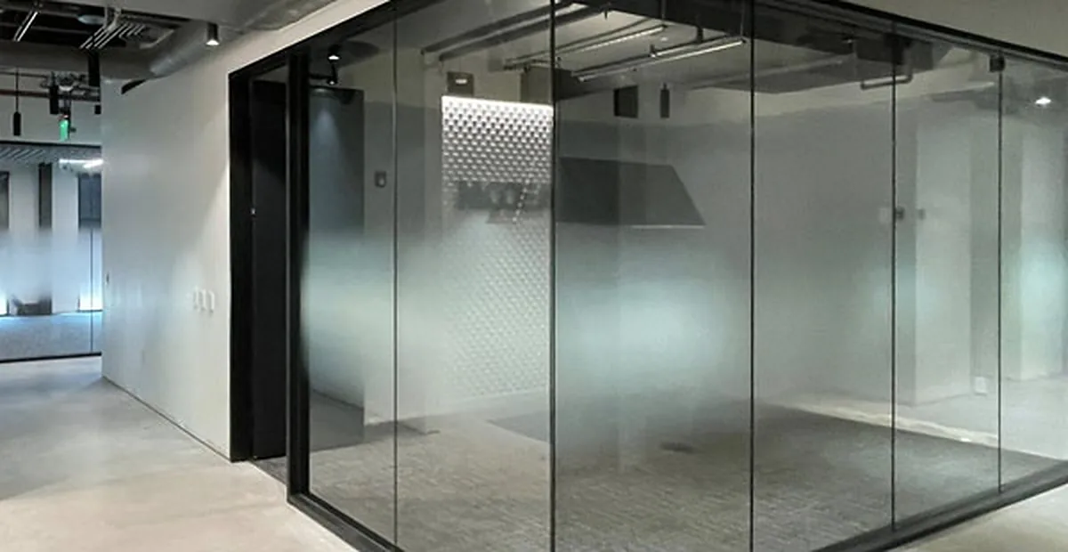 Office interior with solar control film on floor-to-ceiling glass