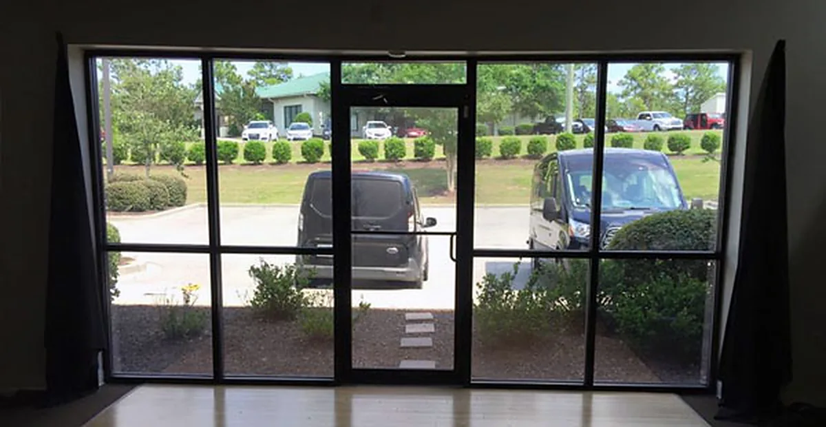 Storefront entry doors with security film